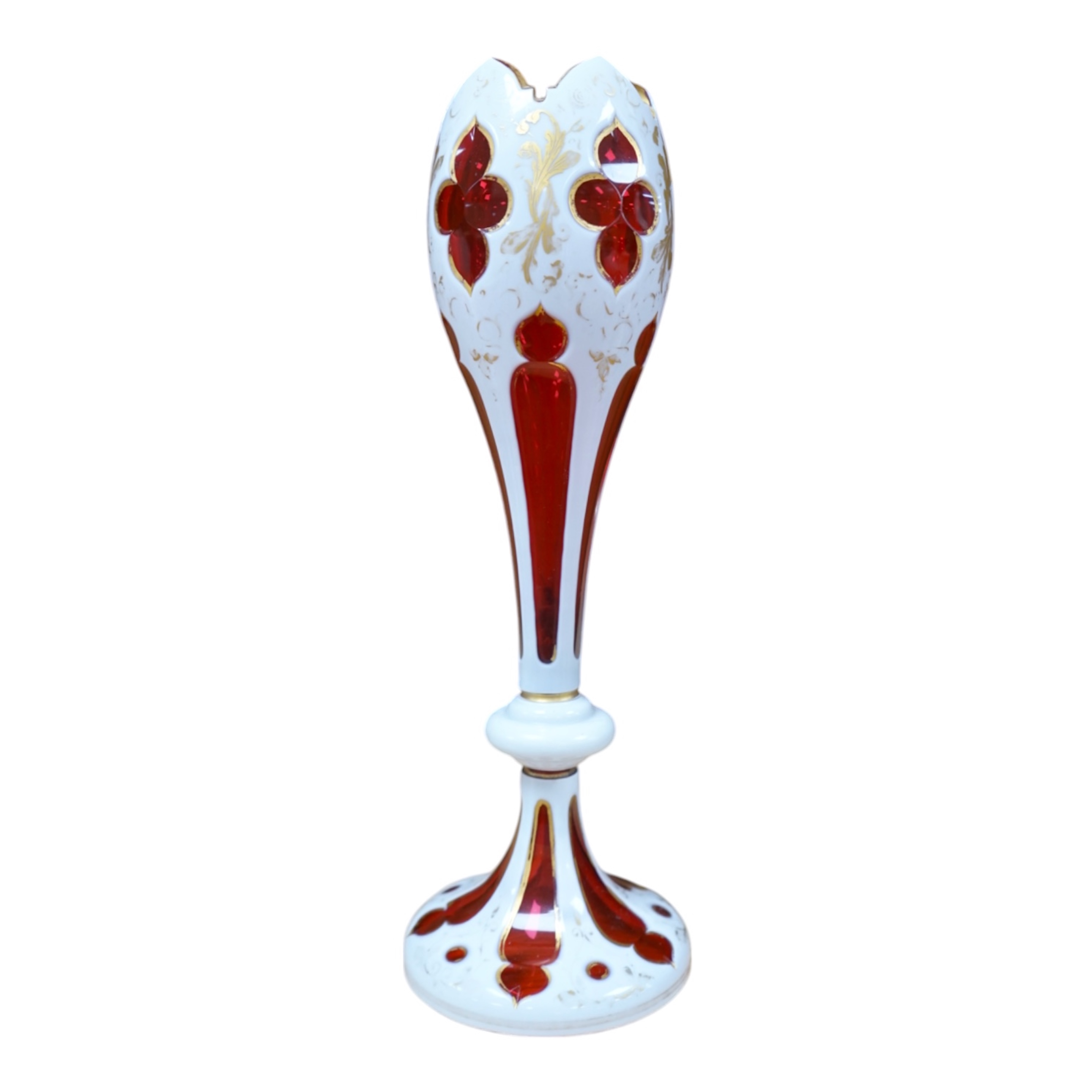 A 19th century Bohemian overlaid glass vase, 29.5cm high. Condition - fair to good, some losses to gilding.